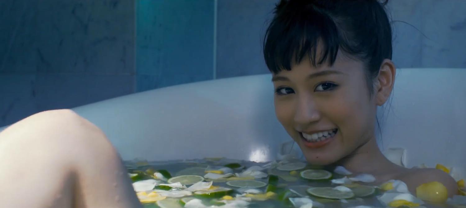 Atsuko Maeda Walks Through Osaka Barefoot and Refreshes in Fruit Baths in the MV for “Selfish”